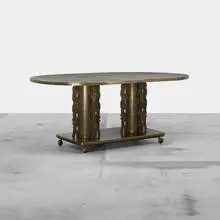 dining table by Philip and Kelvin Laverne, c. 1965, acid-etched and patinated bronze over pewter and wood, brass, sold Apr 2012