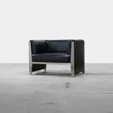 William Sofield, lounge chair, 2000, stainless steel, vinyl