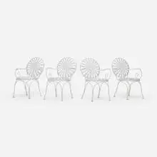 François Carré, Sunburst garden armchairs, set of four, c. 1935, enameled steel