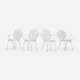 François Carré, Sunburst garden armchairs, set of four, c. 1935, enameled steel