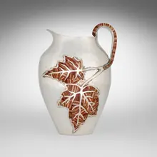 Emilia Castillo, Pitcher with maple leaves, c. 2000, silver-plated metal, jasper inlay
