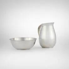 Pitcher and round bowl by Gorham Manufacturing Company, sterling silver, sold Sep 2026