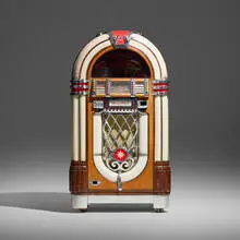 Paul Fuller, Bubbler jukebox, model 1015, 1946, walnut veneer, hardwood, chrome-plated metal, cast metal, molded plastic, glass, steel, rubber, speaker cloth