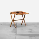Rena Dumas, Pippa folding desk, 1991, pear wood, natural box leather, brass