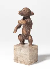 Junger Bär by Renée Sintenis, 1932, Bronze mit goldbrauner Patina, auf Steinsockel montiert, sold Dec 2023