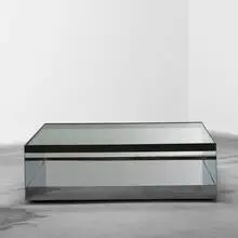 low rolling table, model 6048T by Joseph D'Urso, 1981, stainless steel, safety glass, sold Sep 2011