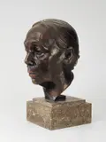 Käthe Kollwitz, Selbstbildnis, 1926, Bronze mit dunkelbrauner Patina, auf gestuften Steinsockel montiert. Höhe (ohne Sockel): 36 cm (14 ⅛ in. )