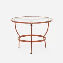Jacques Adnet, Occasional table, c. 1955, stitched leather, brass, glass