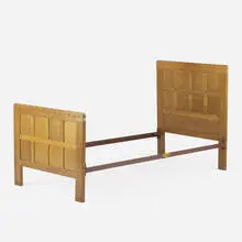 Single bed frame by Robert 'Mouseman' Thompson, c. 1935, carved oak, enameled steel, sold Mar 2021