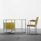 Warren McArthur, desk, model 1541-2 and armchair, model 1135-A, c. 1935, aluminum, lacquered wood, vinyl