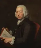 German School, Portrait of a gentleman half-length, holding a copy of Abrege de la Vie des Plus Fameux Peintres, oil on canvas
