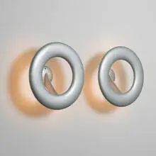 Komed lights, pair by Marc Newson, 1996, enameled fiberglass, aluminum, sold Apr 2011