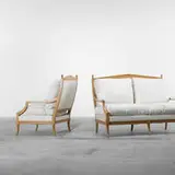 armchair and settee by T. H. Robsjohn-Gibbings, c. 1950, oak, upholstery, sold Apr 2011