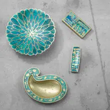 collection of four accessories by Pepe Mendoza, 1958, brass, ceramic, sold Apr 2011