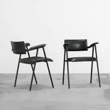 Jacques Adnet, armchairs, pair, c. 1950, leather, enameled steel, brass
