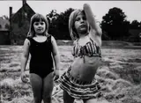 David Akiba, Untitled (Two Girls in Swimsuits), circa 1970, Gelatin silver print; signed in ink on the overmat; matted
