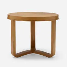 Coffee table by Jacques Adnet, c. 1950, oak, offered Dec 2023