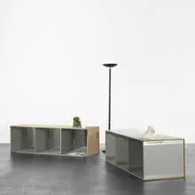 Manfred Pernice, Merzbank, 2004, two wooden shelves, mirrors, halogen lamp, paper box, ashtray, ceramic foot, vase and color laser prints
