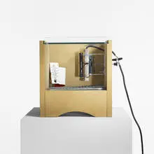 Single Egg Incubator by Andrea Zittel, 1991, MDF, heating element, glass and metal mesh, sold Sep 2010