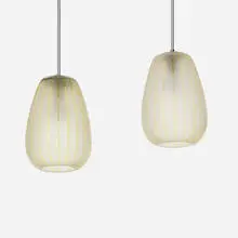Wilhelm Wagenfeld, Diana hanging lights, set of two, c. 1954, frosted and engraved glass with applied metallic and translucent film, chrome-plated brass and steel, plastic