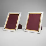 Picture frames, pair by Claude Moliterni, offered Apr 2025