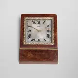 Desk clock by Claude Moliterni, c. 1935, walnut burl, silver, gold, glass, offered Jul 2024