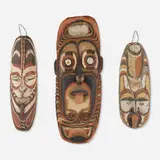 Papuan, Sepik masks, set of three, carved and pigmented wood, shells