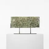 Arman, untitled, 1977-78, dollar bills encased in acrylic with chrome-plated steel base