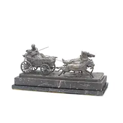 Hans C. Guradze, early 20th century patinated bronze figural group of an amorous couple seated in a horse drawn hay bale wagon, patinated bronze