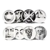 Group of Eight Themes and Variations Dinner Plates by Piero Fornasetti, porcelain, each signed with Fornasetti mark and numbered, sold Mar 2022