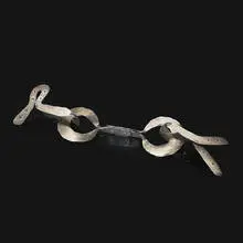 Alexander Calder, buckle, c. 1940, hammered sterling silver