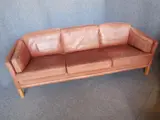 Mogens Hansen, BROWN LEATHER THREE-SEAT SOFA back length 216cm