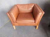 Mogens Hansen, BROWN LEATHER ARMCHAIR