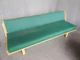DAYBED WITH GREEN UPHOLSTERY back length 206cm by Hans J. Wegner, sold Nov 2013