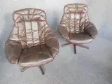 BROWN LEATHER ARMCHAIRS ON SWIVEL BASES by Pair Of H.W. Klein, sold Nov 2013