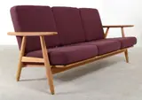 A GE-240/3 SOFA, designed c.1955 by Hans J. Wegner, 1955, oak, fabric, sold Mar 2013