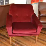 H .W. Klien, A BURGUNDY VELVET ARMCHAIR, c1960