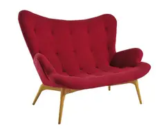A R161 CONTOUR SETTEE, DESIGNED 1951 by Grant Featherston, 1951, original plywood shell c.1955, new fabric, chair base manufactured by Gordon Mather Industries c.1995, sold Oct 2012