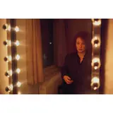 Self-portrait in the mirror, Hotel Baur, Zürich, 1998 by Nan Goldin, 1998, cibachrome print, sold Feb 2009