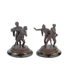 pair of patinated bronze figural groups  of 'Les Tragediens' by Emile Guillemin, patinated bronze, offered Sep 2022