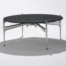 pre-production coffee table by Alexander Girard, c. 1965, Emerald Pearl granite, aluminum, sold Mar 2007