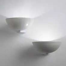 Kurt Versen, sconces, pair, c. 1935, enameled cast and spun aluminum