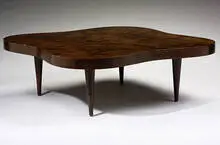 Gilbert Rohde, coffee table, model #4188, c. 1940, acadia burl, leather, brass