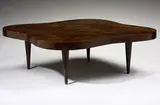 Gilbert Rohde, coffee table, model #4188, c. 1940, acadia burl, leather, brass