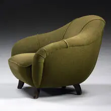 Easy chair, model #3950 by Gilbert Rohde, c. 1933, upholstery, walnut, sold Mar 2007