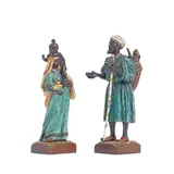Franz Bergman, Two cold painted bronze figures of a male beggar and a female beggar carrying a baby on her shoulders, cold painted bronze