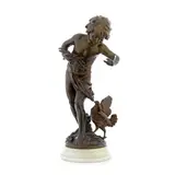 Auguste Moreau, patinated bronze figure of a young boy and a hen, patinated bronze