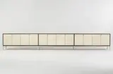 Florence Knoll, triple cabinet, c. 1965, walnut, lacquered caning, lacquered wood, stainless steel