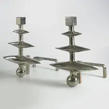 Samuel Marx, andirons, c. 1941, nickel-plated steel and iron