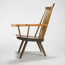 Lounge chair with one arm by George Nakashima, 1966, American black walnut, hickory, sold Mar 2007